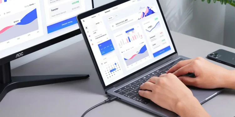 How to connect two monitors to a laptop